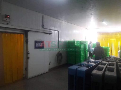 Industrial cold storage room with goods and temperature monitoring system for warehouse and food preservation