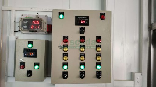 Industrial electrical control panel with temperature monitoring system and alarm indicators for cold storage environment