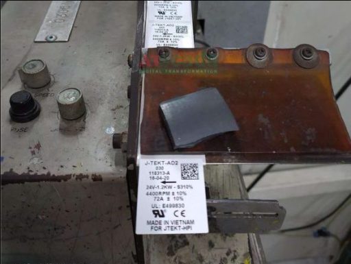 Industrial metal component inspection with measurement tools and labeled sample for quality control in manufacturing process